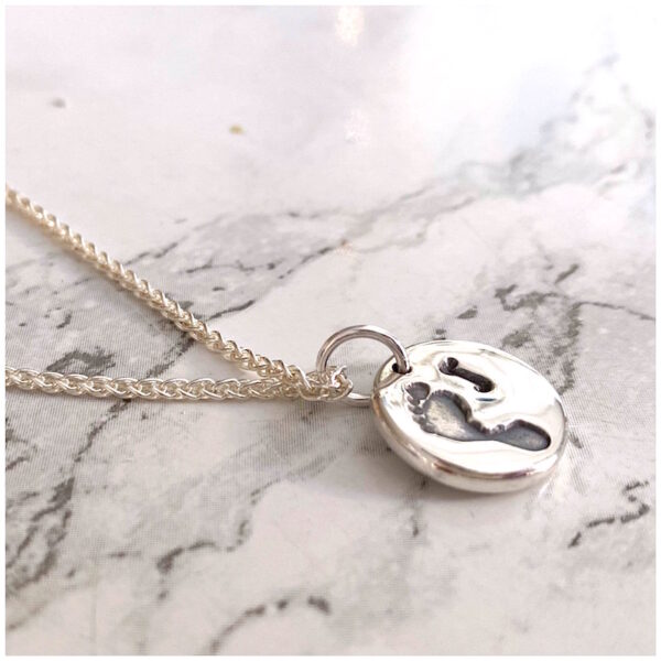 Double Sided Circular Pendant