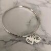 Hammered Bangle with Charms - Image 2
